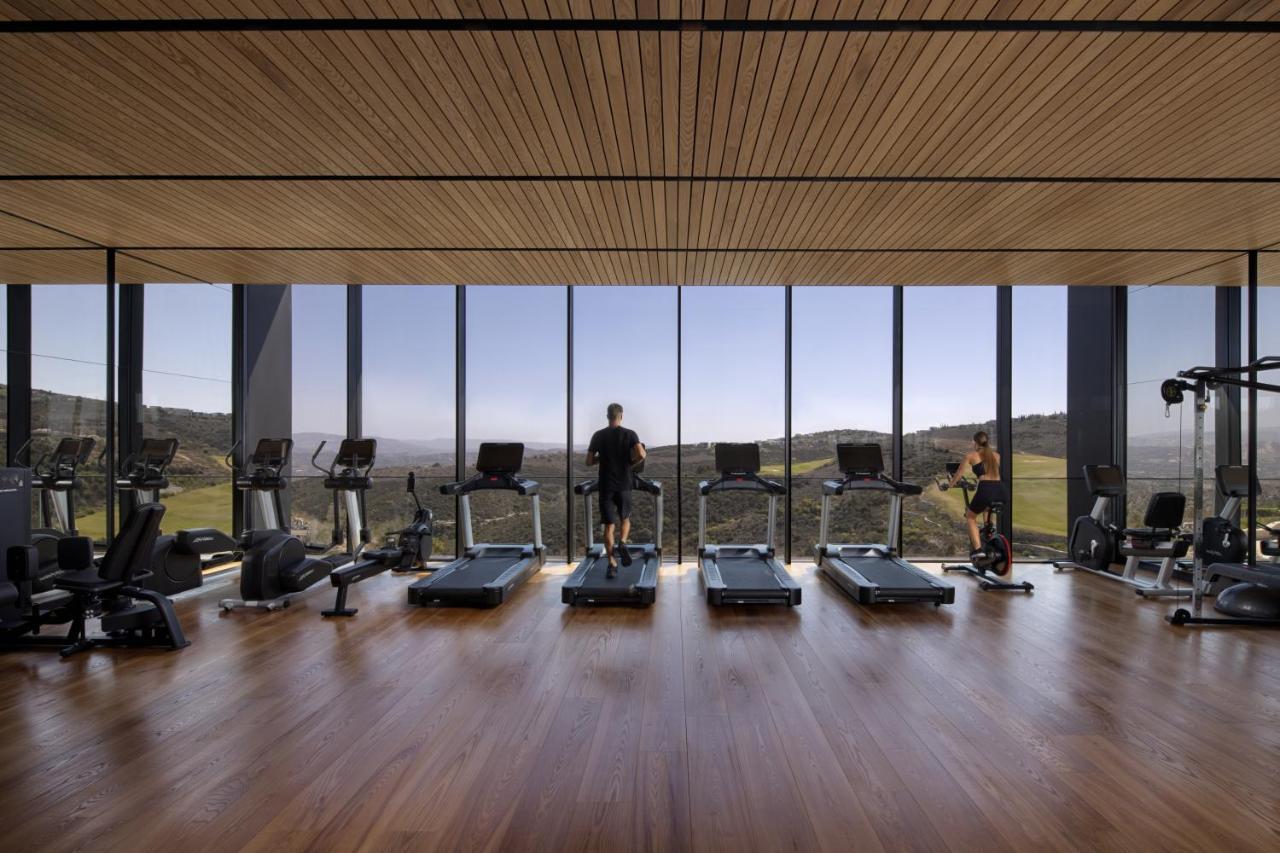Minthis Resort Tsadha Exteriér fotografie The gym at the hotel